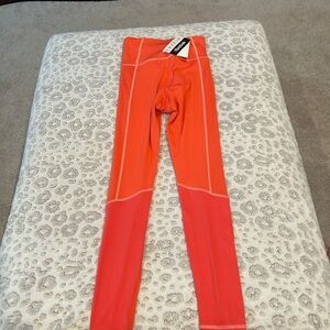 NWT Reebok Size XS Core IO Orange Rave Running Tights